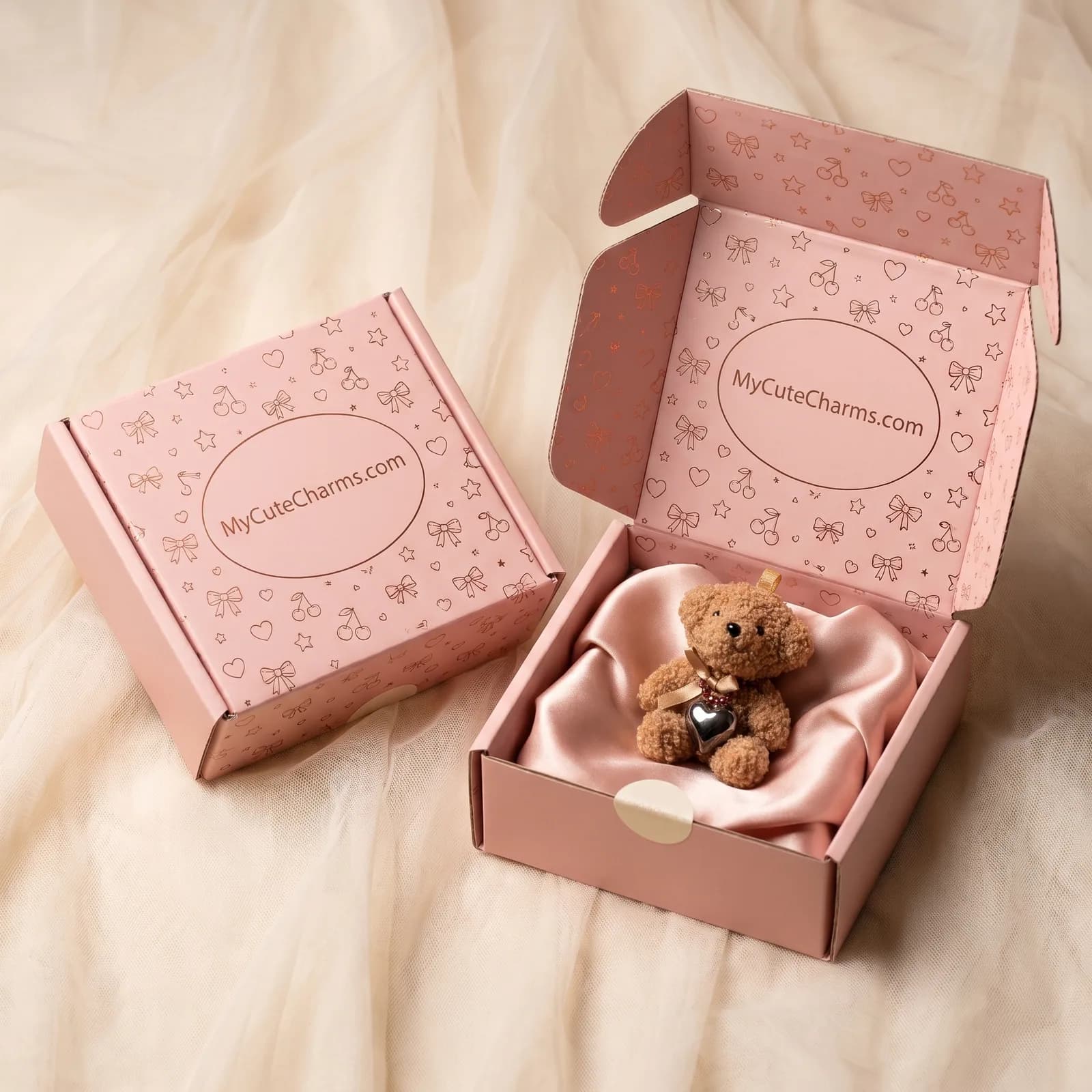 Charm order arriving in a cream gift box with a ribbon