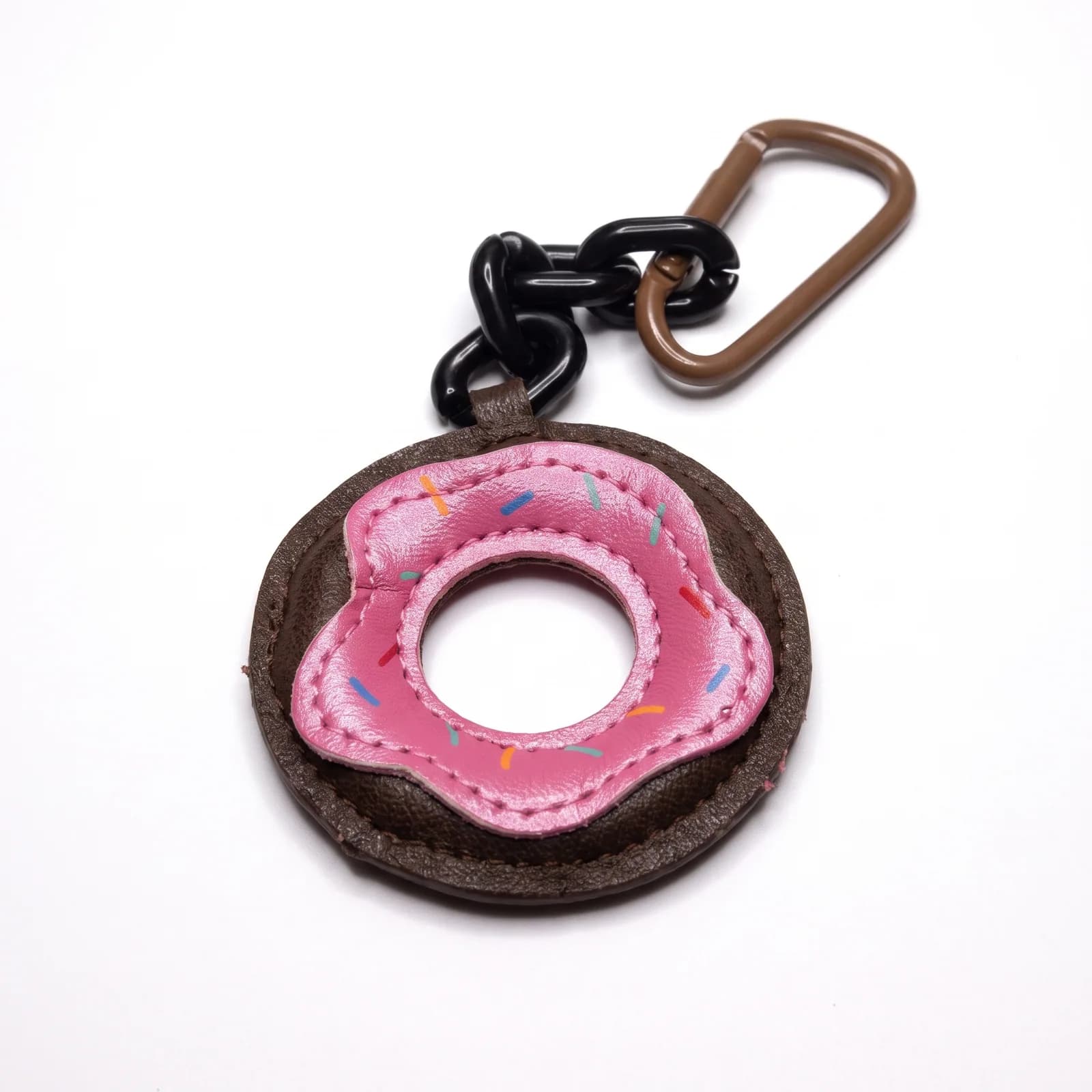 Doughnut leather charm on a white background