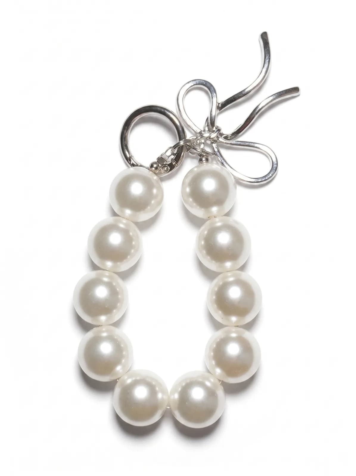 Pearl loop charm on a white background